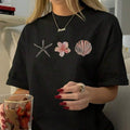 Graphic TeesWomen's Cotton Oversized T-Shirt With Starfish, Flower & Shell Print, Casual Short Sleeve Round Neck Tee, Loose Fit Top, S-5XL Sizes, Summer Beach Vacation Fashion, Soft Breathable Basic T-Shirt For Daily Wearcotton Summer Tops