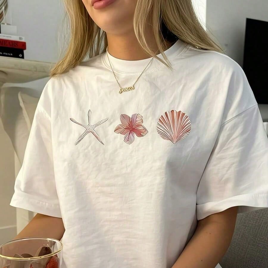Graphic TeesWomen's Cotton Oversized T-Shirt With Starfish, Flower & Shell Print, Casual Short Sleeve Round Neck Tee, Loose Fit Top, S-5XL Sizes, Summer Beach Vacation Fashion, Soft Breathable Basic T-Shirt For Daily Wearcotton Summer Tops