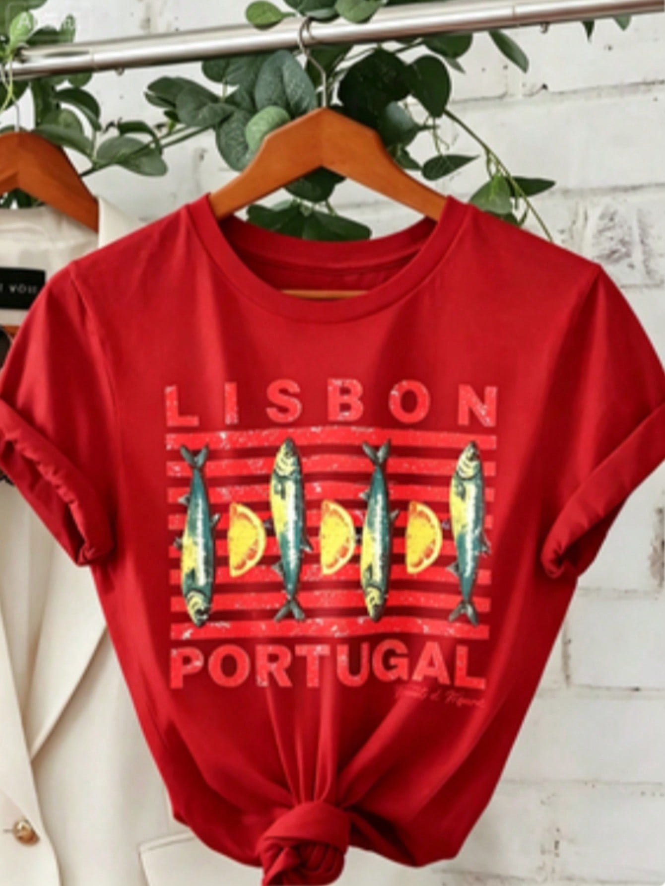 Soft Breathable "Wo" Lisbon Portugal Pattern Printed T-Shirt | Vibrant Tile Art And Tram Design, Paired With Canned Sardines And Lisbon Portuguese Letters, A Lightweight Short-Sleeved Round-Neck Casual Top, Regular Fit H-Line, Machine Washable For Year-Ro
