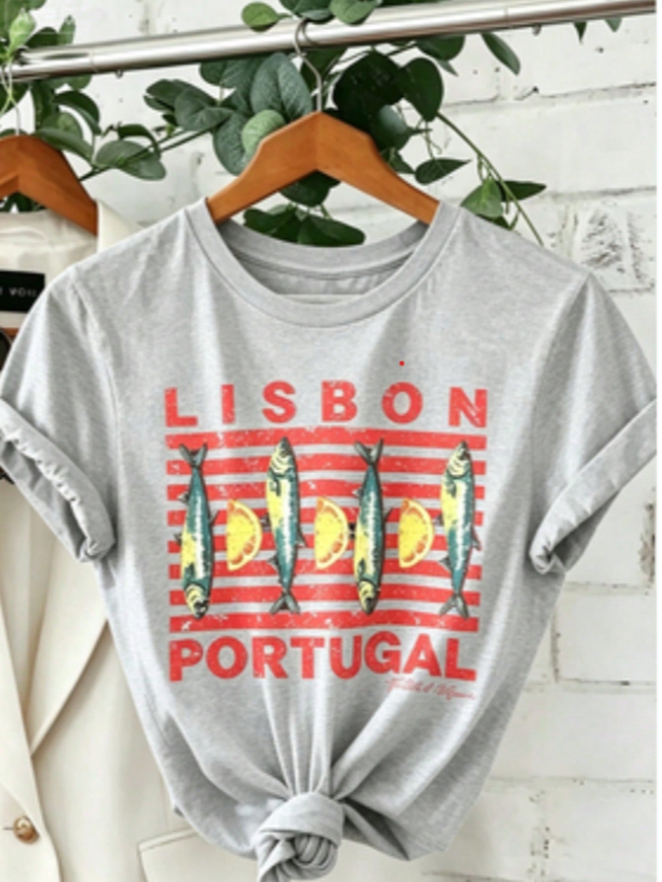 Soft Breathable "Wo" Lisbon Portugal Pattern Printed T-Shirt | Vibrant Tile Art And Tram Design, Paired With Canned Sardines And Lisbon Portuguese Letters, A Lightweight Short-Sleeved Round-Neck Casual Top, Regular Fit H-Line, Machine Washable For Year-Ro